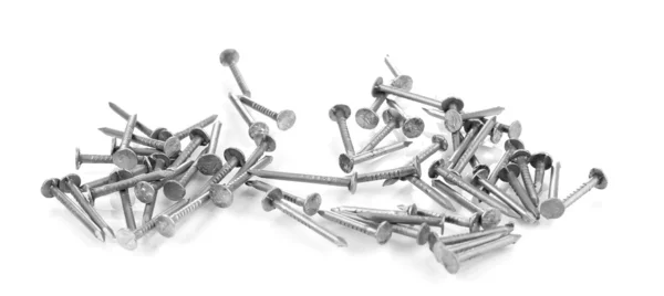 Metalen nagels geïsoleerd op wit — Stockfoto