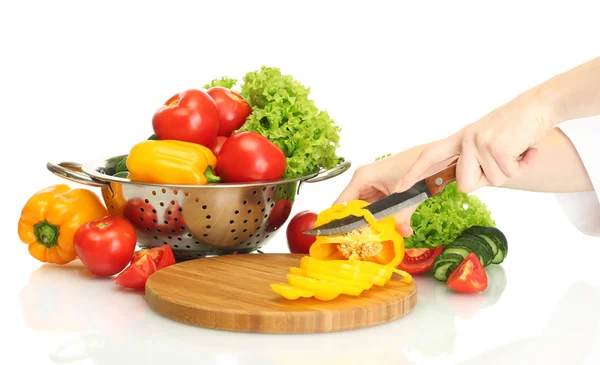 Woman hands cutting vegetables on kitchen blackboard — Stock Photo, Image