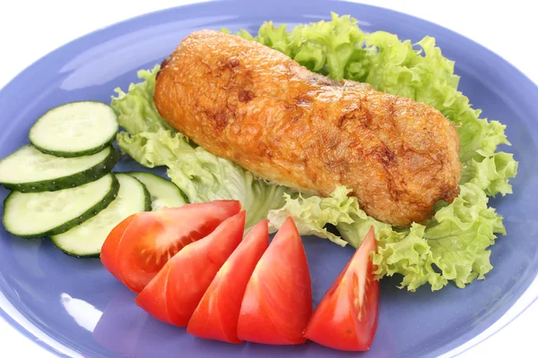 Tasty meat cutlet with garnish on plate close-up — Stock Photo, Image
