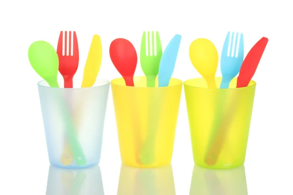 Bright plastic disposable tableware isolated on white background — Stock Photo, Image