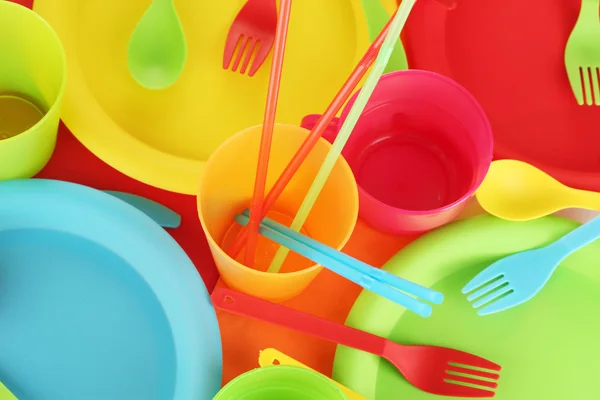 Bright plastic disposable tableware close-up — Stock Photo, Image