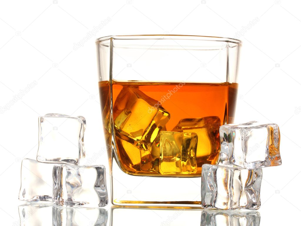 Glass of scotch whiskey and ice isolated on white
