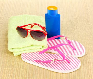 Beach accessories on mat