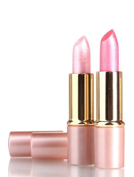 Beautiful pink lipsticks isolated on white — ストック写真
