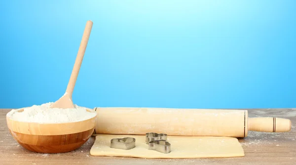 stock image Cooking cookies on blue background close-up