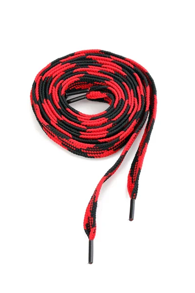 Красочные шнурки, изолированные на белом — стоковое фото