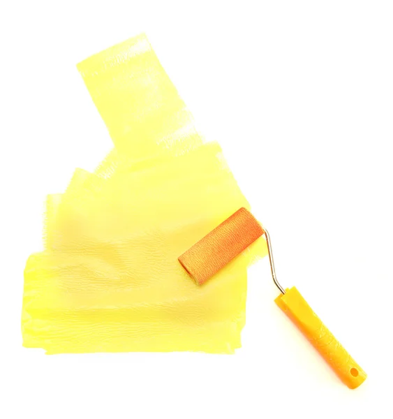 Ролик с желтой краской изолирован на белом — стоковое фото