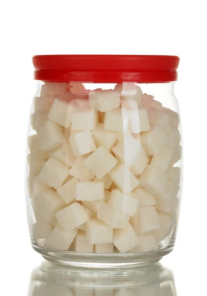 Frasco com um açúcar de caroço branco isolado sobre branco — Fotografia de Stock