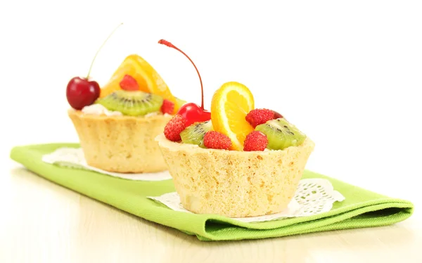 Fa asztalra gyümölcsökkel, édes sütemény — Stock Fotó