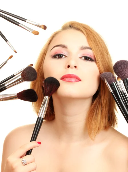 Porträt einer schönen Frau mit Make-up-Pinseln — Stockfoto