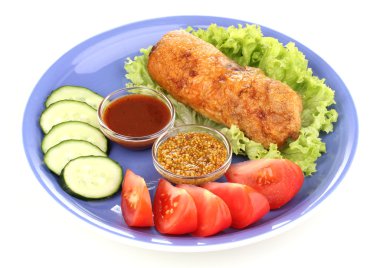 Tasty meat cutlet with garnish on plate isolated on white