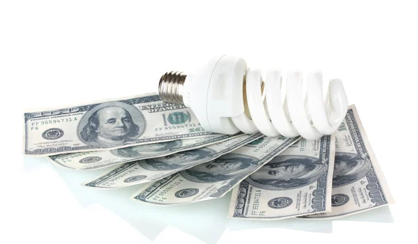 Lâmpada de poupança de energia e dinheiro isolado em branco — Fotografia de Stock