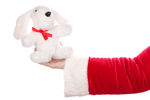 Papai Noel mão segurando brinquedo coelho isolado no branco — Fotografia de Stock