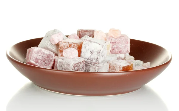 Delicious turkish delight in the plate isolated on white — Stock Photo, Image