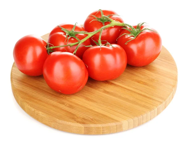 Fresh tomatoes on wooden board isolated on white — Stock Photo, Image