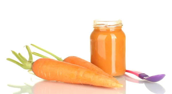 Jar with carrot baby food and spoon isolated on white — Stock Photo, Image