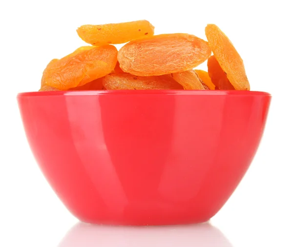 Delicious dried apricots in bright bowl isolated on white — Stock Photo, Image