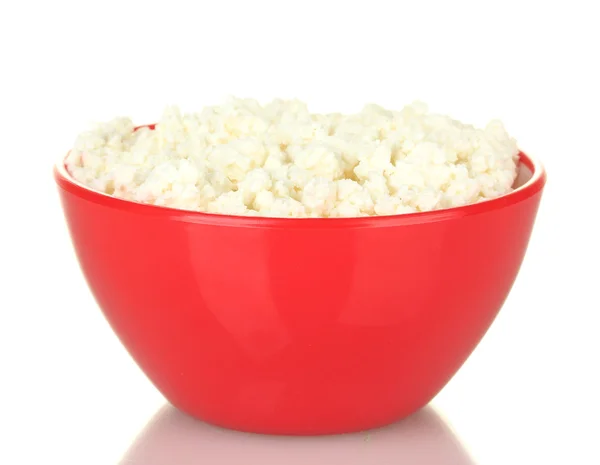Cottage cheese in red bowl isolated on white — Stock Photo, Image