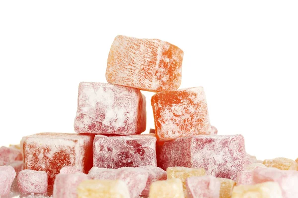 Tasty pieces of turkish delight on white background close-up — Stock Photo, Image