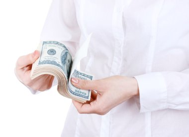 Fake American dollars in a women hands on a white background clipart