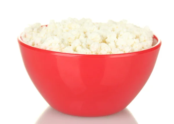 Cottage cheese in red bowl isolated on white — Stock Photo, Image