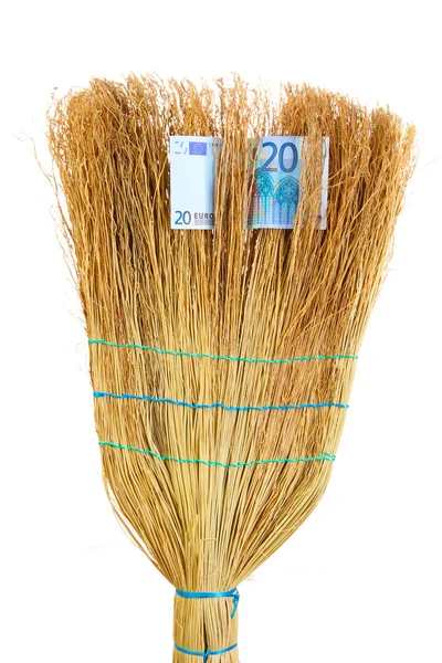 Broom sweep the euro close-up — Stock Photo, Image
