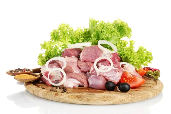 Pieces of raw meat and vegetables on wooden board isolated on white — Stock Photo, Image
