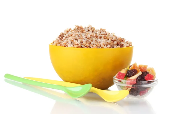 Boiled buckwheat in a yellow bowl isolated on white — Stock Photo, Image