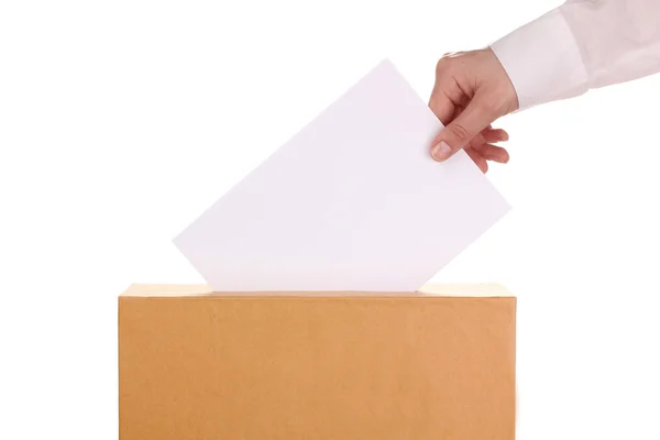 Hand med omröstningen sluten omröstning och box isolerad på vit — Stockfoto