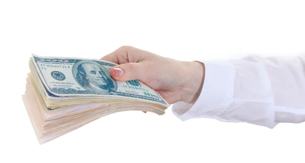 Американские доллары в женской руке на белом фоне — стоковое фото