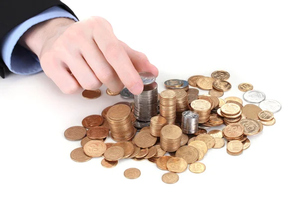 Empresario mano poner monedas aisladas en blanco — Foto de Stock