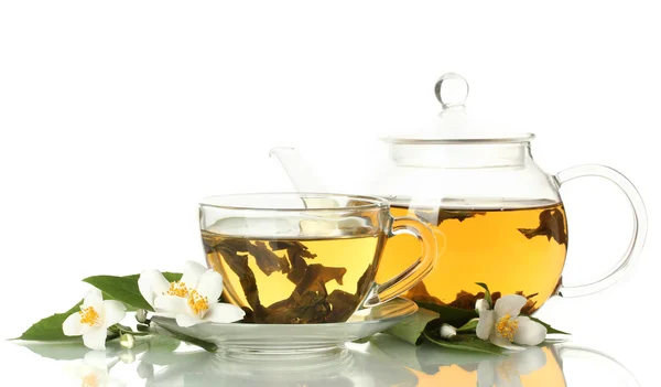 Green tea with jasmine in cup and teapot isolated on white Stock Photo