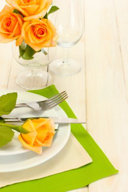 Beautiful holiday table setting with flowers clipart