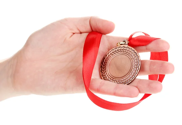 Medalha de bronze na mão isolada em branco — Fotografia de Stock