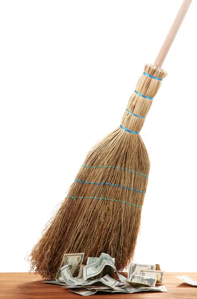Broom sweep the dollars on white background — Stock Photo, Image