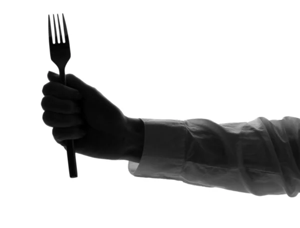 Stock image Silhouette of woman's hand with fork isolated on white