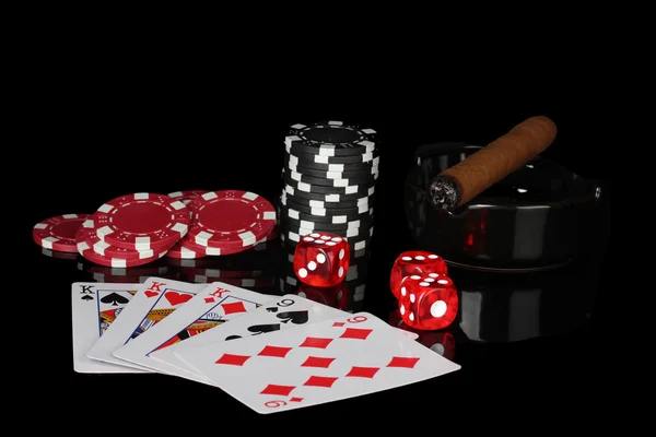 Full house of poker chips and dice on black background — Stock Photo, Image