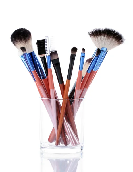 Make-up brushes in glass cup isolated on white — Stock Photo, Image