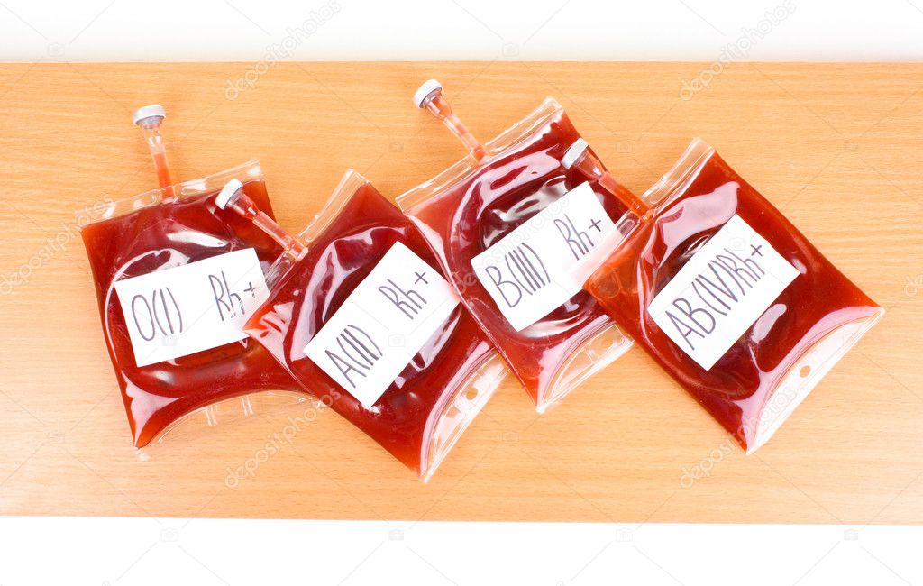 Bags of blood on wooden background