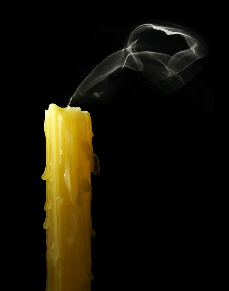 stock image Candle with abstract smoke on black background