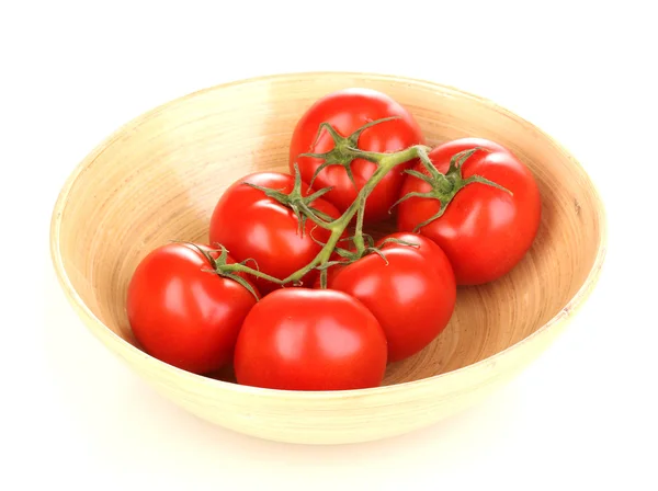 Fresh tomatoes in wooden bowl isolated on white — Stock Photo, Image