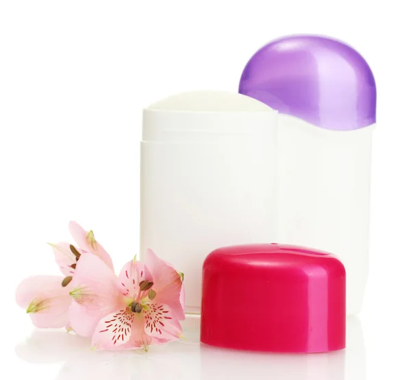 Desodorizantes com flores isoladas em branco — Fotografia de Stock