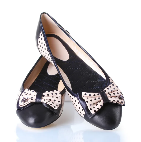 Female flat ballet shoes patterned with black polka dots isolated on white — Stock Photo, Image