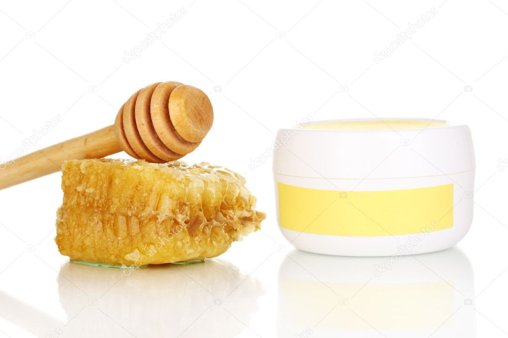 Jar of cream with honey isolated on white