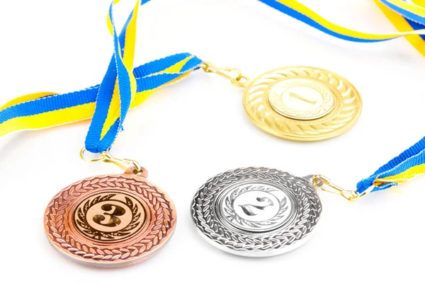 Tres medallas aisladas en blanco —  Fotos de Stock