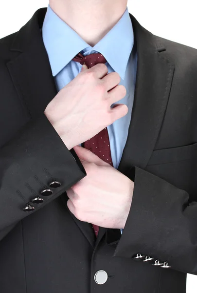Homme d'affaires corriger une cravate de près — Photo