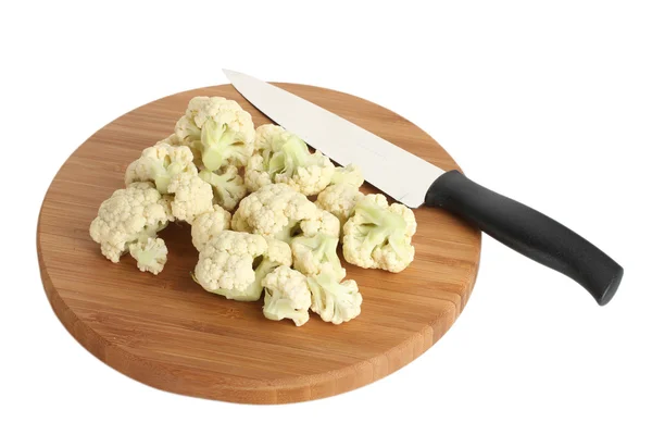 Fresh cauliflower and knife on cutting board isolated on white — Stock Photo, Image