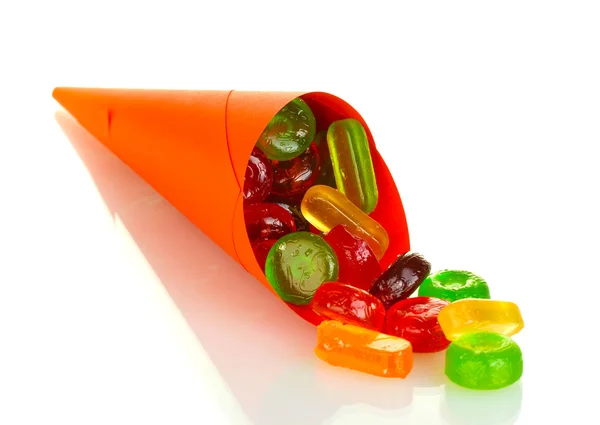 Gustose caramelle colorate in borsa luminosa isolate su bianco — Foto Stock