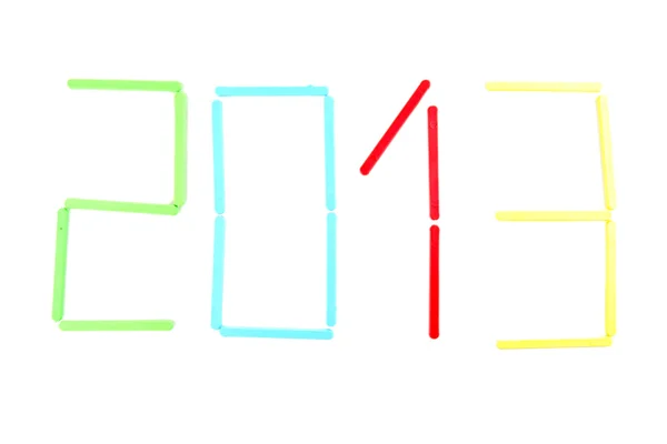 Цветные палочки, сформированные в 2013 году изолированы на белом — стоковое фото