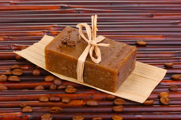 Hand-made soap on bamboo mat — Stock Photo, Image
